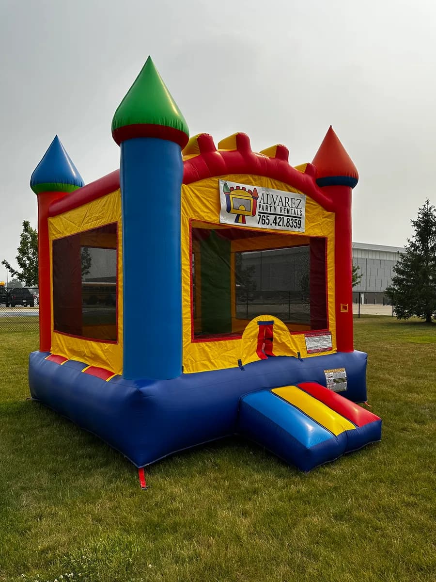 Castle bounce house inflated in a yard